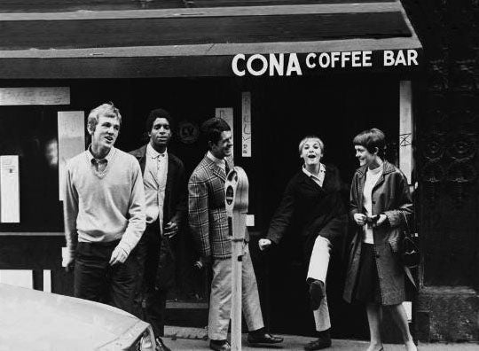 British mods grabbing coffee at a coffee shop