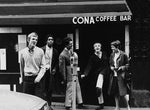 British mods grabbing coffee at a coffee shop